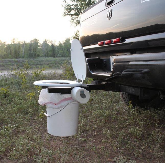 portable camping toilet for trucks attached to the back of the truck 